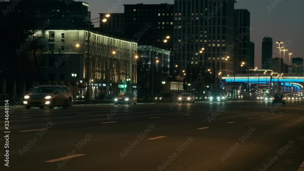 Citi car traffic on the night street with lights