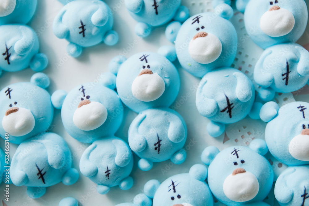 Small edible marshmallow cubs of blue color shot on macro Small edible marshmallow cubs of blue color shot on macro