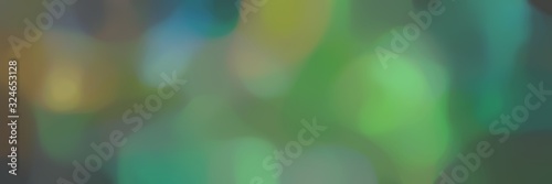 unfocused landscape format background graphic with dim gray, pastel green and pastel brown colors and space for text or image
