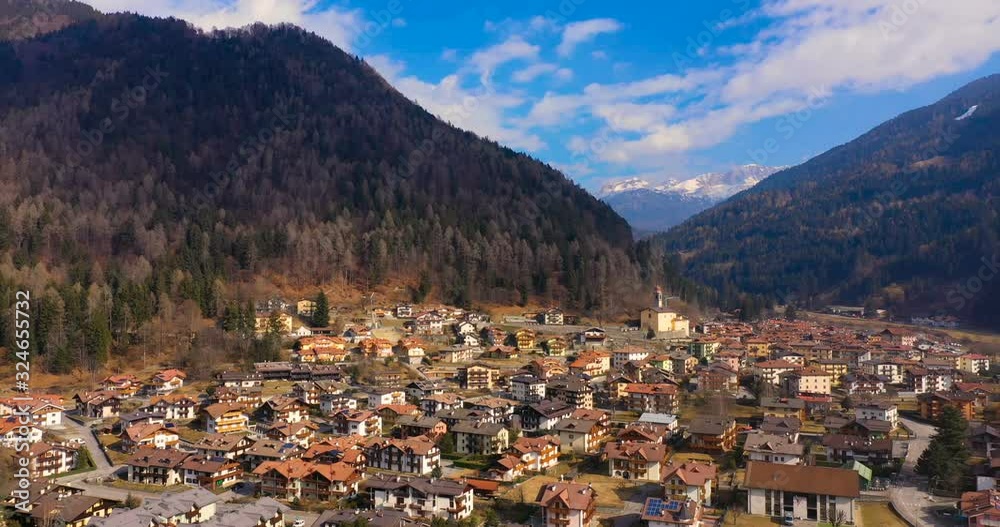 Ariel view of city consisting of large number of small houses and some greenery around it beautiful landscape. Ariel view of city consisting of large number of small houses and some greenery around it beautiful landscape.