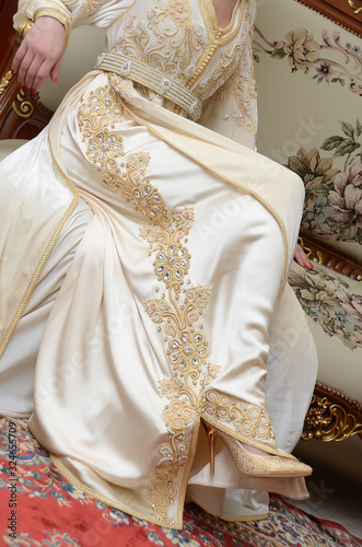 Moroccan caftan close-up. Gold embroidery. One of the most famous clothes in the world. The formal dress for women in Morocco