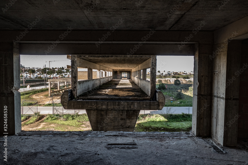 ruin of an unfinished concrete skeleton building