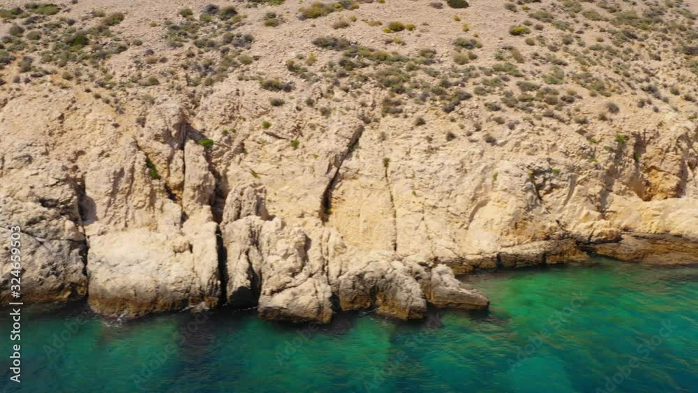 Adriatic Sea Cliffs at Golden Bay Beach on Island of Krk in Croatia, Aerial Adriatic Sea Cliffs at Golden Bay Beach on Island of Krk in Croatia, Aerial
