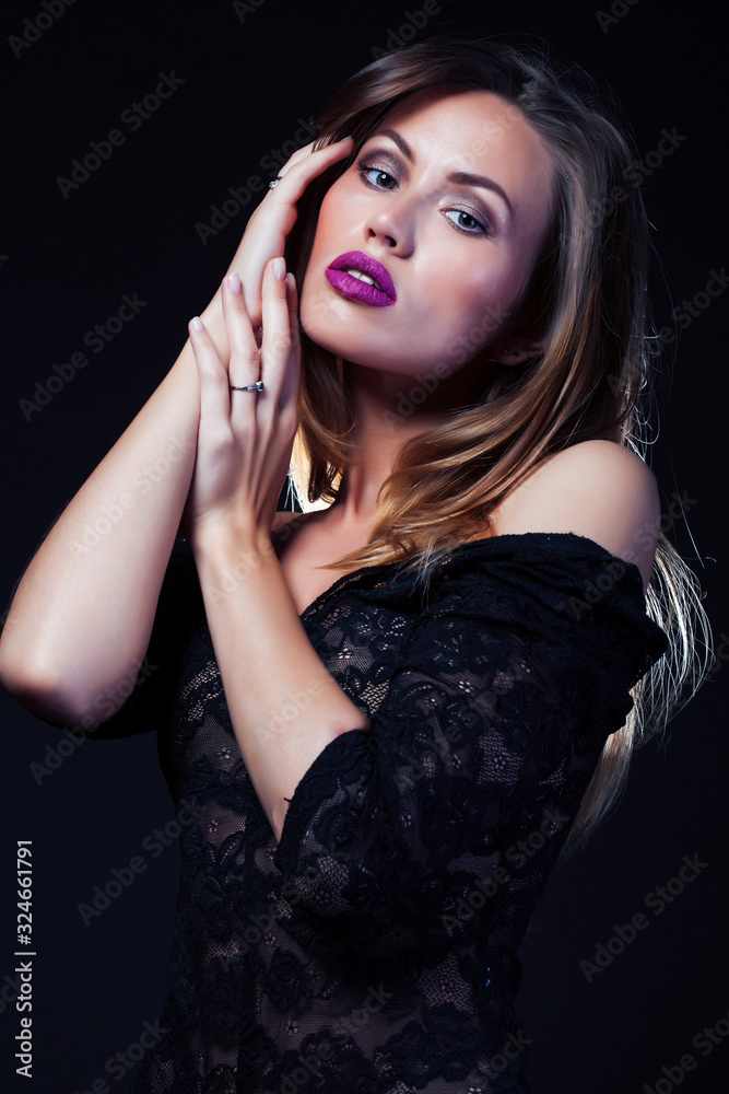 young lady posing emotional on black background, lifestyle people concept