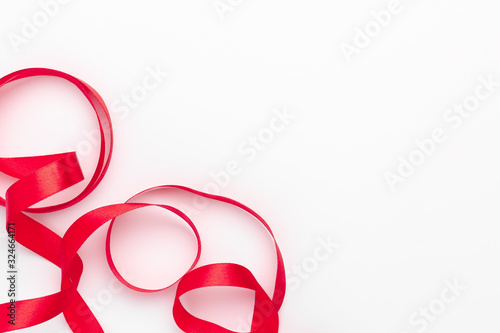 A red ribbon on a white background.
