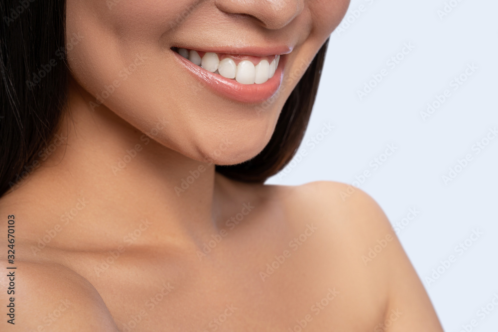 Close up of young female that demonstrating her smile Close up of young female that demonstrating her smile