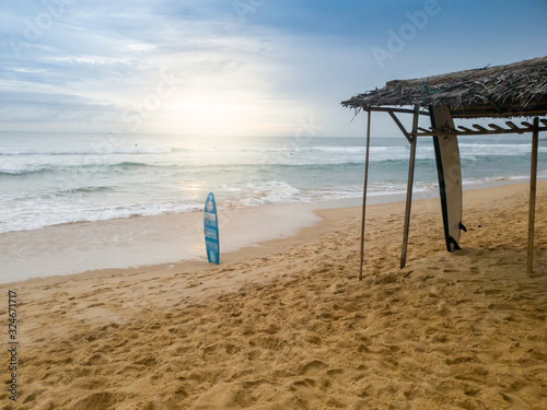 Fototapeta Naklejka Na Ścianę i Meble -  Beautiful image of surboard rental on the ocean beach