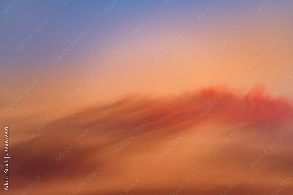 Abstract background with orange sky and red clouds. Travel destination Russia