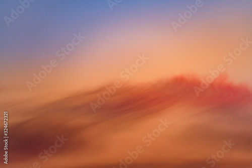 Abstract background with orange sky and red clouds. Travel destination Russia © MKozloff