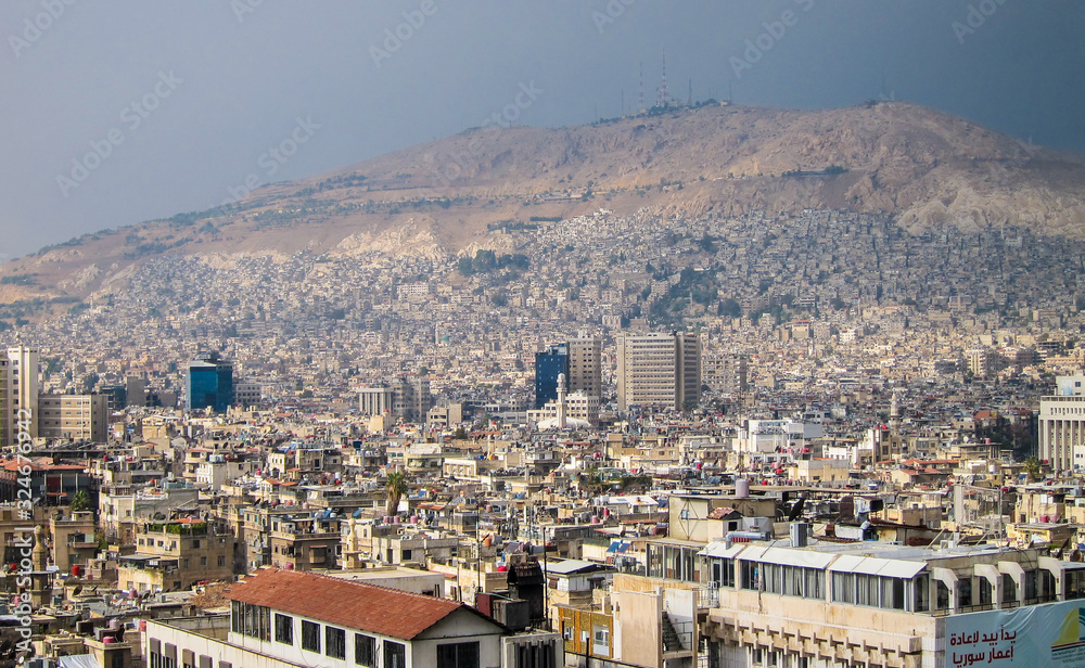Wide shot of the city and Mount of  Qasioun mountin in Damascus, Syria