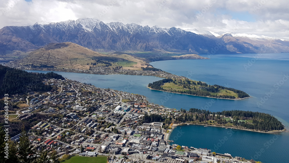 Queenstown New Zealand from view point with mountains and town