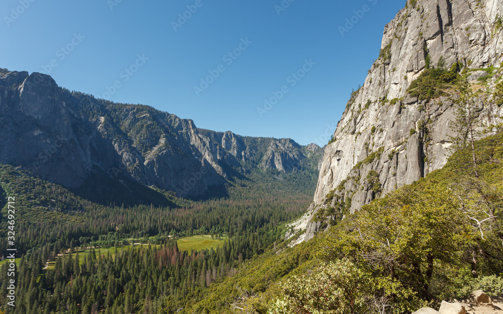 Elevated view of Yosemite Valley in summer with clear blue sky