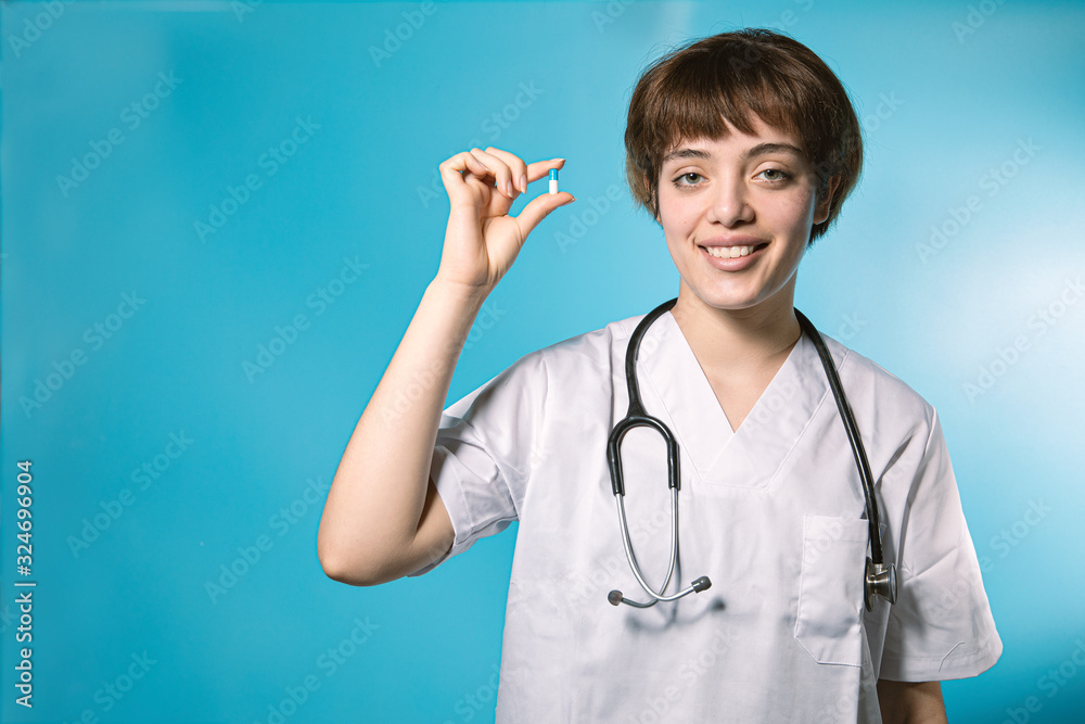 Young doctor cures virus with pills Young doctor cures virus with pills