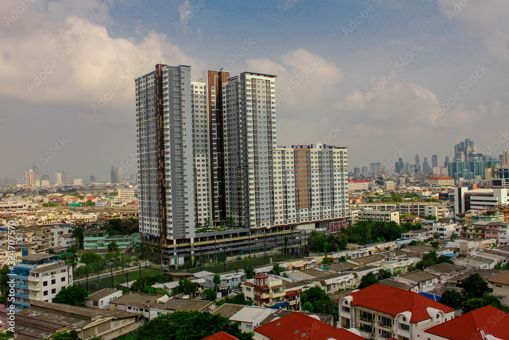Naklejka premium Bangkok -30 March 2013:Evening light and the colors of rain clouds are beautiful in the area of Rama 3, Dindang Expressway-Daokanong, Thailand.