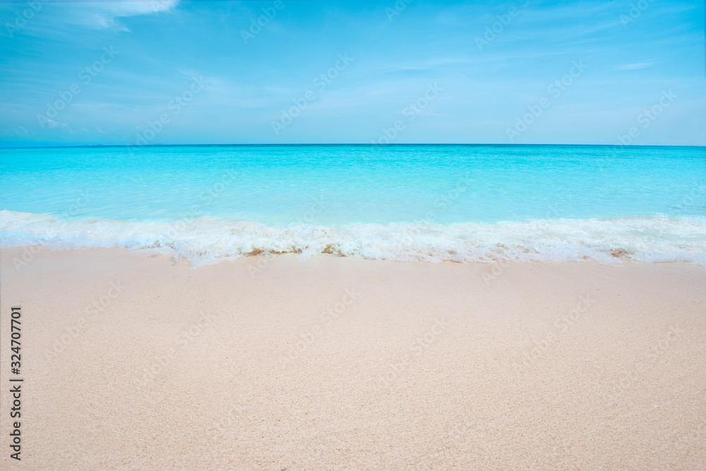  Soft Blue Ocean Wave On Sandy Beach. View of nice tropical beach. Holiday and vacation concept. Tropical beach.