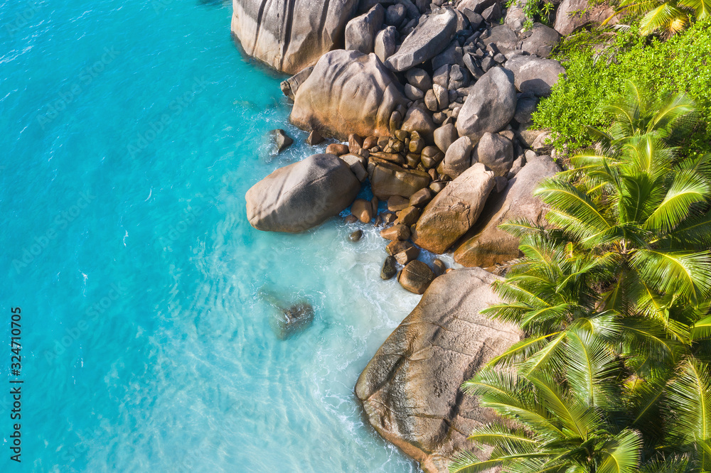 Stunning Anse Lazio beach drone aerial view in Praslin Island Seychelles Turquoise ocean water 