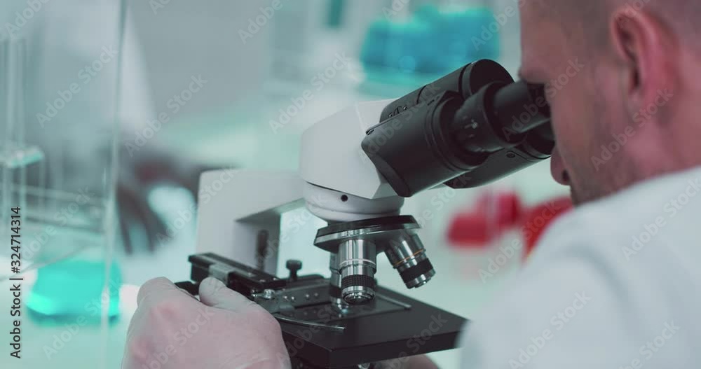 Scientists working in laboratory Scientists working in laboratory