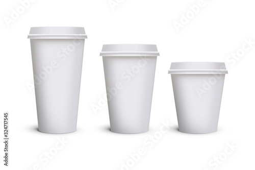White blank takeaway paper, carton or cardboard coffee cup in different size on isolated white background, including clipping path for cutout. Empty tea mockup for presentation on isolated background.