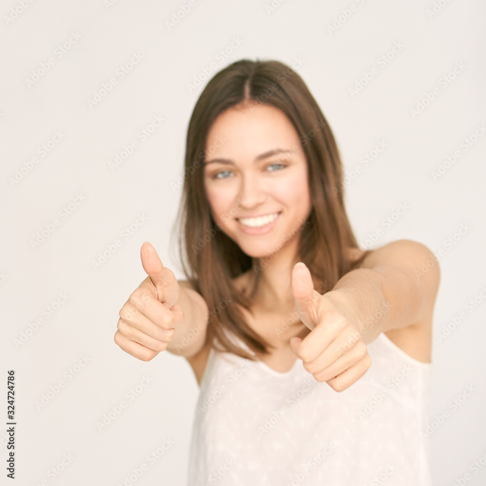 Girl show thumb up. Approve gesture. Young woman studio pretty portrait. Happy yes sign. Female person satisfied winner. Girl show thumb up. Approve gesture. Young woman studio pretty portrait. Happy yes sign. Female person satisfied winner.