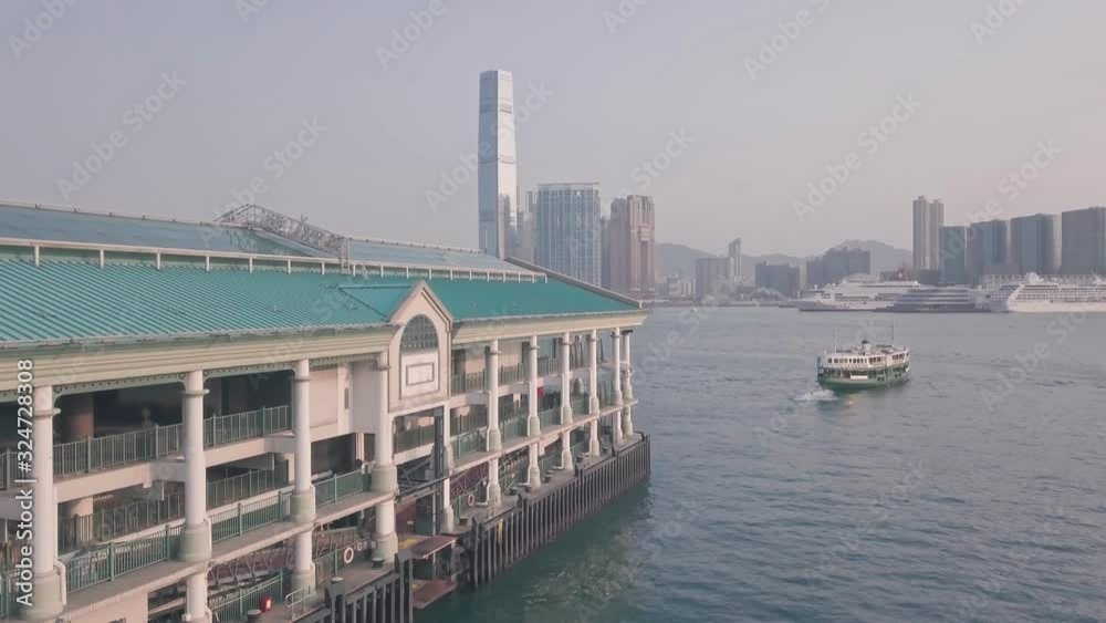 Hong Kong star ferry, central terminal and harbour front. Aerial drone view Hong Kong star ferry, central terminal and harbour front. Aerial drone view