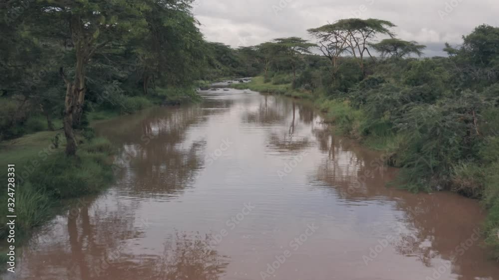 Aerial drone view of Kenyan river landscape scenery in Laikipia, Kenya Aerial drone view of Kenyan river landscape scenery in Laikipia, Kenya