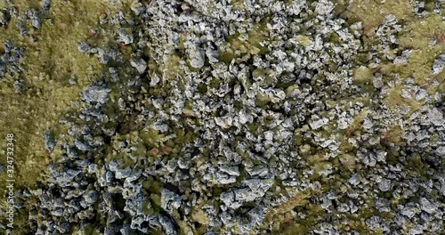 Aerial rotating take off showing sharp edges of lava field photo