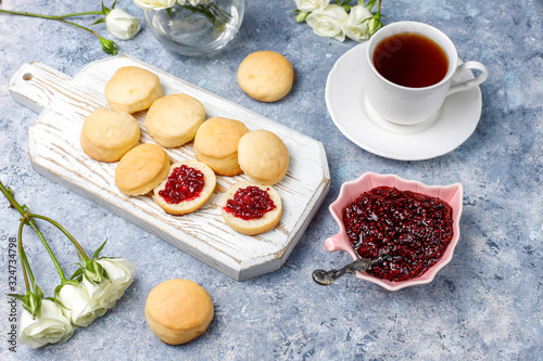 Homemade delicious cookies serving with raspberry jam top view