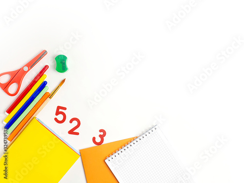school supplies on a white background. The concept of the school.