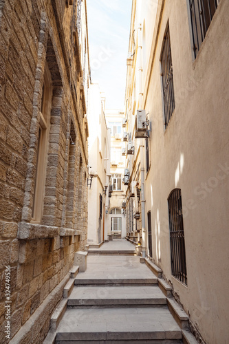 Narrow street of the Old city, toned