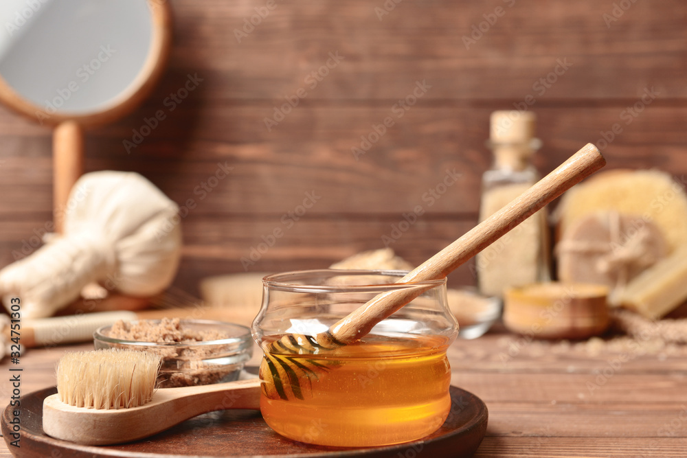 Composition with spa items and honey on table Composition with spa items and honey on table