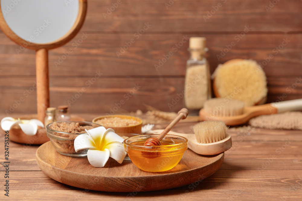 Composition with spa items and honey on table Composition with spa items and honey on table