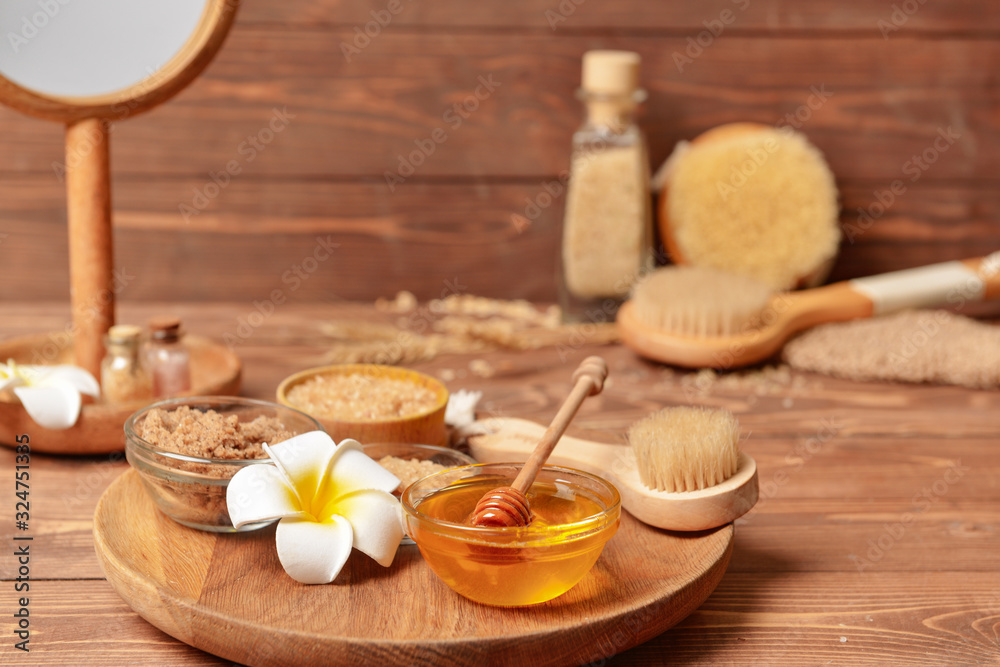 Composition with spa items and honey on table Composition with spa items and honey on table