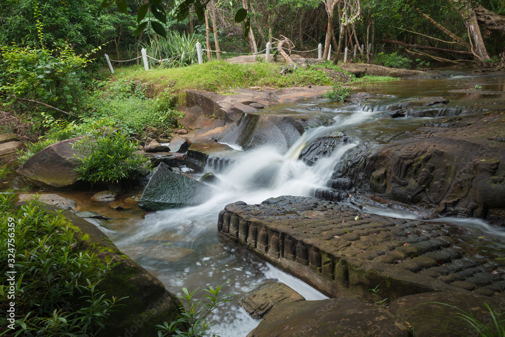 Fototapeta premium The scenery of the Kbal Spean the mystery waterfall on Kulen mountains range of the ancient Khmer empire in Siem Reap province of Cambodia.