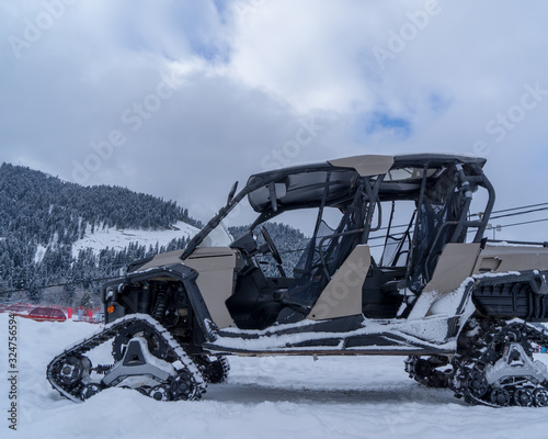 The image of the ATV with a tracked system.