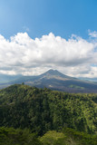 The scenery of the Kintamani Volcano with a beautiful sky and green forest in Bali, Indonesia.