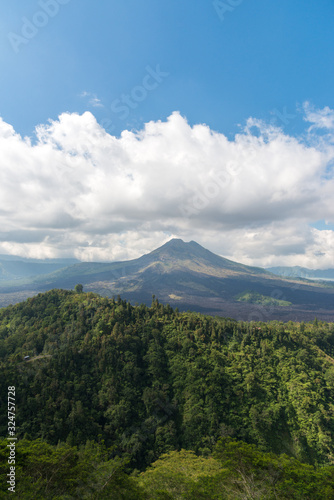 The scenery of the Kintamani Volcano with a beautiful sky and green forest in Bali  Indonesia.