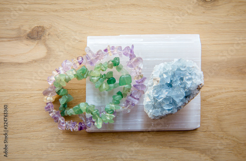 Cuadro en lienzo Natural Selenite crystal charging plate is used to cleansing and charging other crystals semi precious stones and jewelry made with natural precious stones