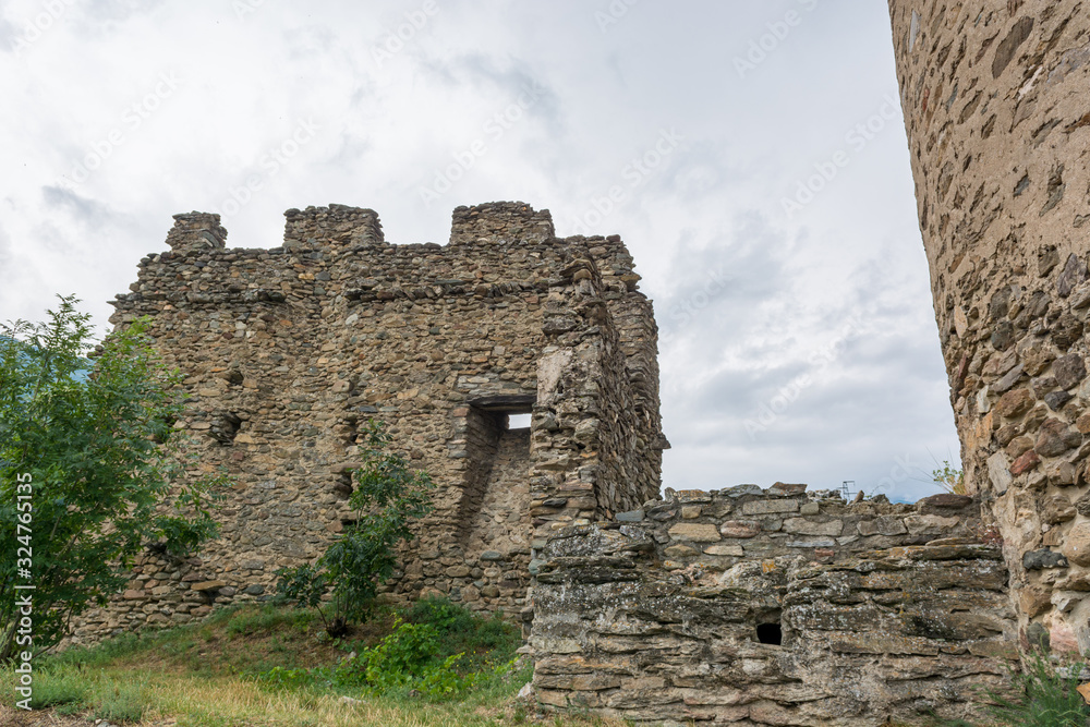 Ruins of old castle on a hill above Aosta.