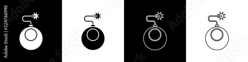Set Bomb ready to explode icon isolated on black and white background. Vector Illustration