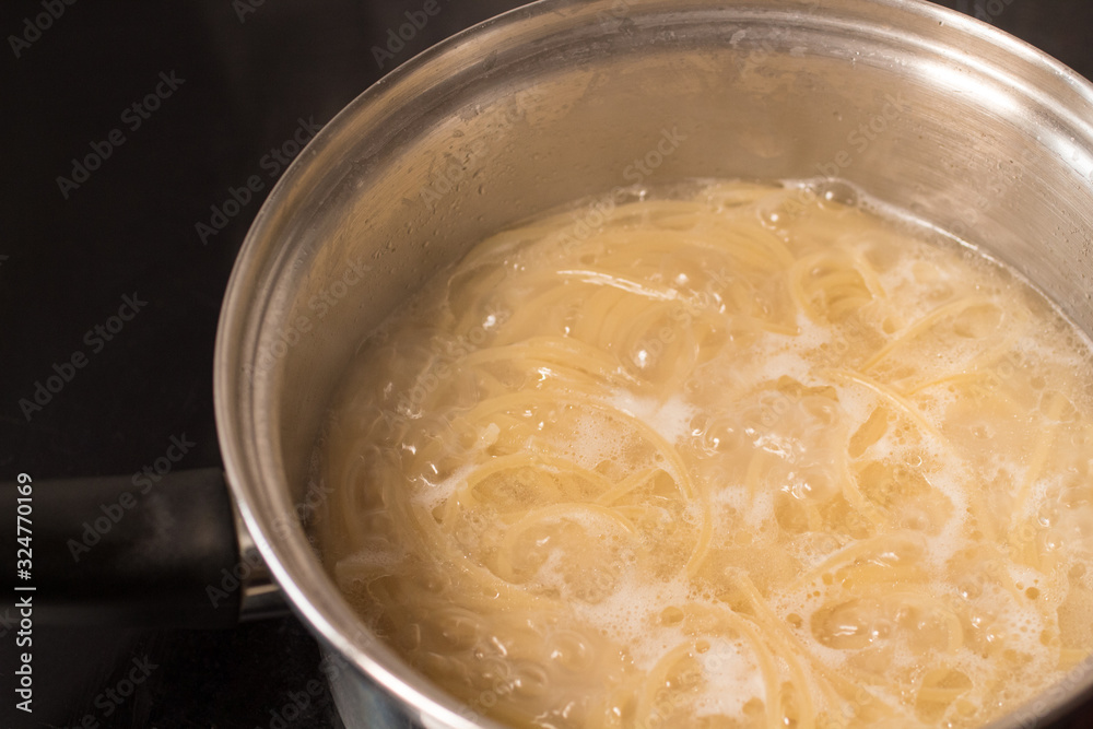 pasta is cooked in a pot pasta is cooked in a pot