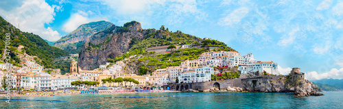 Panoramic view, aerial skyline of small haven of Amalfi village with tiny beach and colorful houses, located on rock, Amalfi coast, Salerno, Campania, Italy photo
