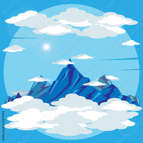 Blue mountain landscape. Peaks, clouds and sky
