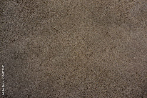 Stucco surface of a house wall as an abstract background.