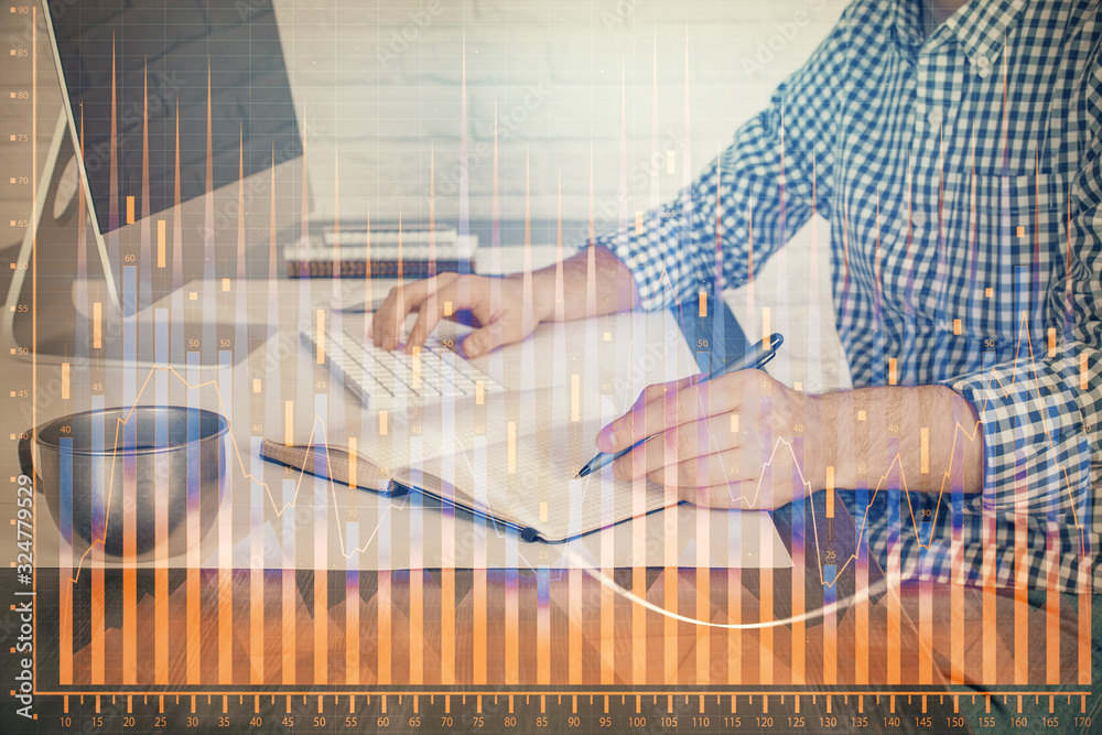 Double exposure of stock market chart with man working on computer on background. Concept of financial analysis. Double exposure of stock market chart with man working on computer on background. Concept of financial analysis.