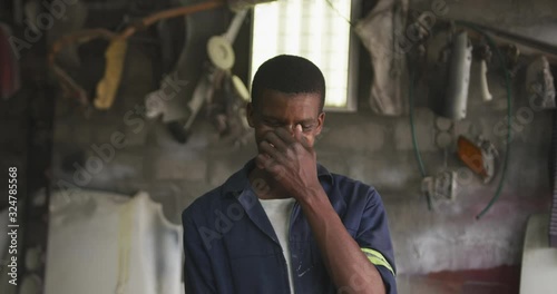 Wallpaper Mural African handyman smiling at camera Torontodigital.ca