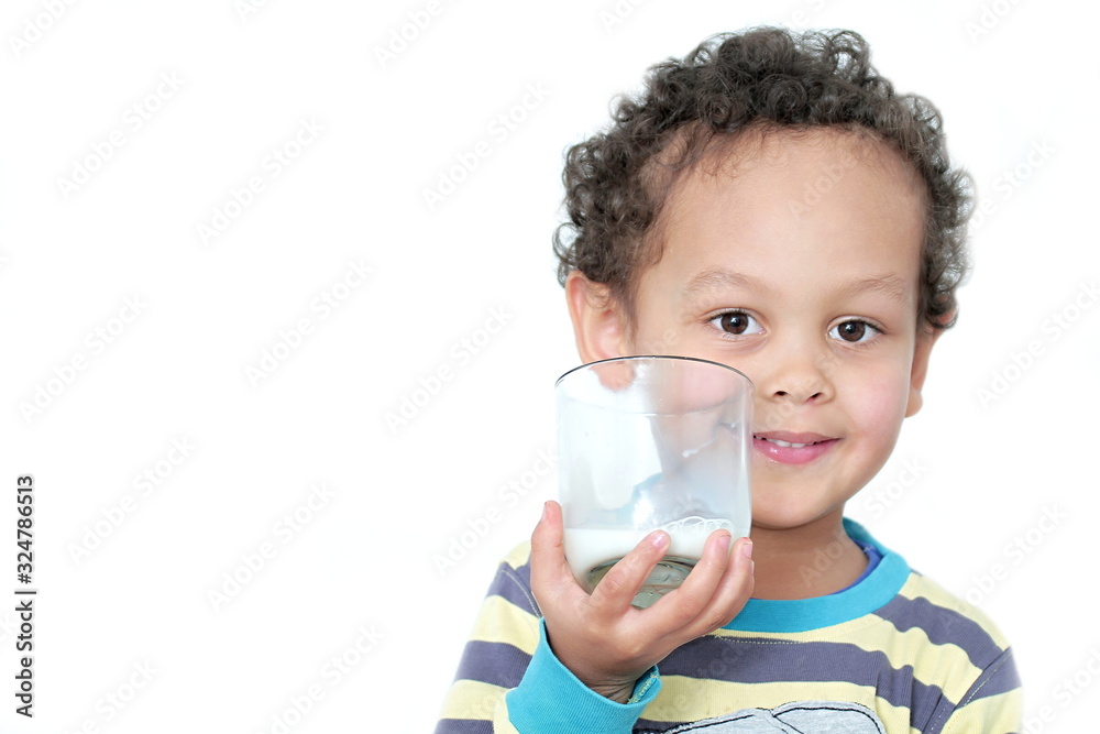 child drinking milk for breakfast on white background stock photo child drinking milk for breakfast on white background stock photo