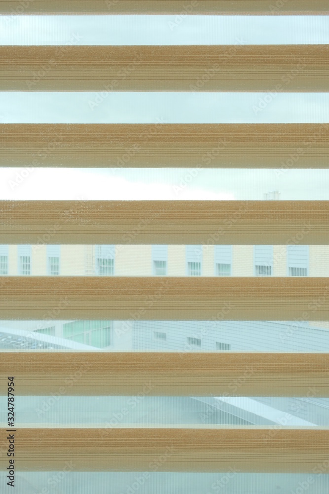 Window with roll blinds. Window with roll blinds.