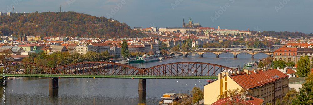 Prague - The panorama of the city with the bridges and the Castel in the backgroun from Vysehrad.