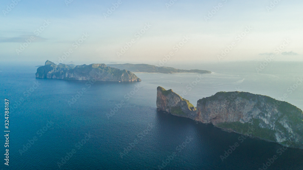 Top view of isolated rocky tropical island with turquoise water and white beach. Aerial view of Phi-Phi Leh island with Maya Bay and Pileh Lagoon. Krabi province, Thailand.
