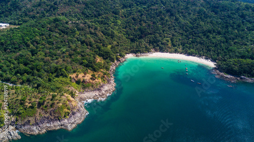 Aerial shooting of Freedom beach, Phuket, Thailand. Beautiful tropical island with white sand beach and turquoise clear water © F8  \ Suport Ukraine